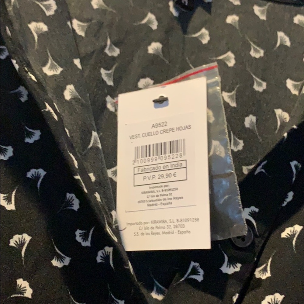 Black dress with floral print. - Picture 2 of 7